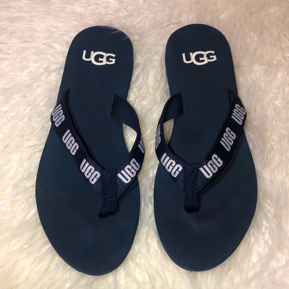 navy blue UGG flip flops